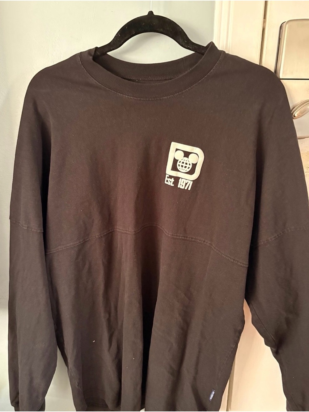 Disney Black Long-Sleeve spirit jersey with White Logo